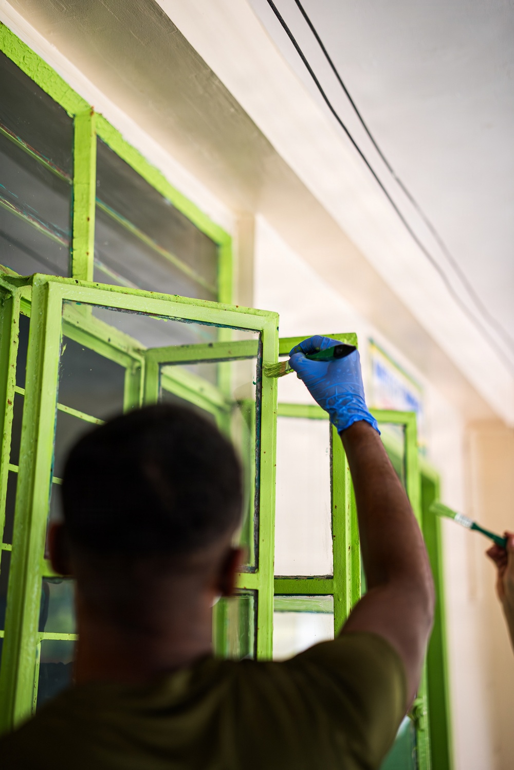 U.S. Marines and Philippine service members participate in Bobon Elementary Eskwela