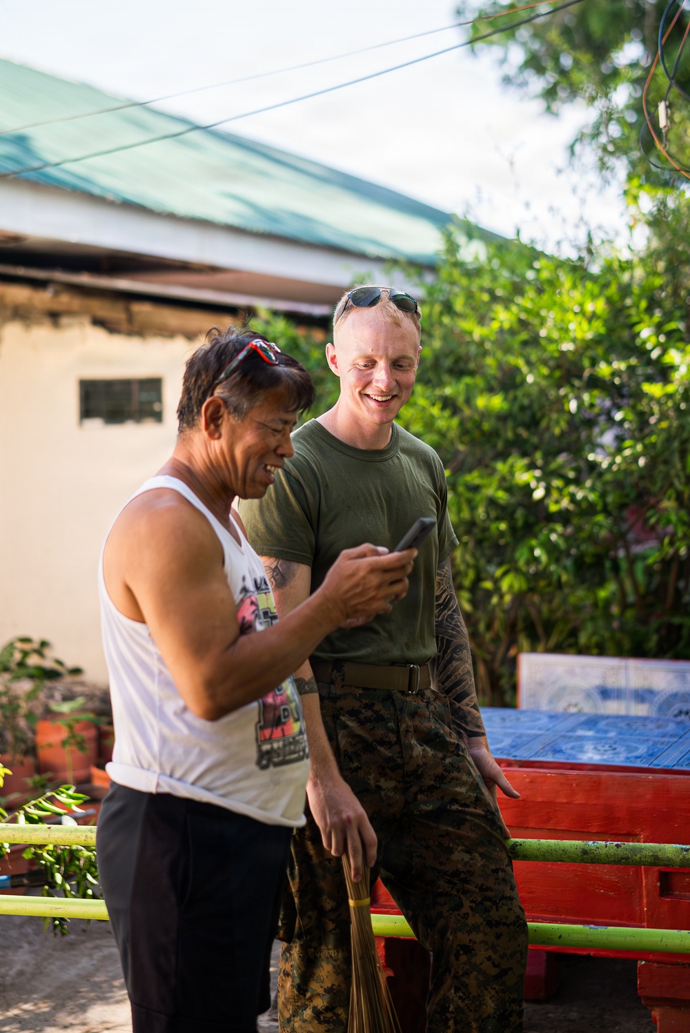 U.S. Marines and Philippine service members participate in Bobon Elementary Eskwela