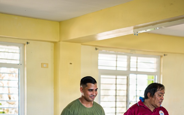 U.S. Marines and Philippine service members participate in Bobon Elementary Eskwela