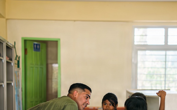 U.S. Marines and Philippine service members participate in Bobon Elementary Eskwela