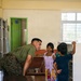 U.S. Marines and Philippine service members participate in Bobon Elementary Eskwela