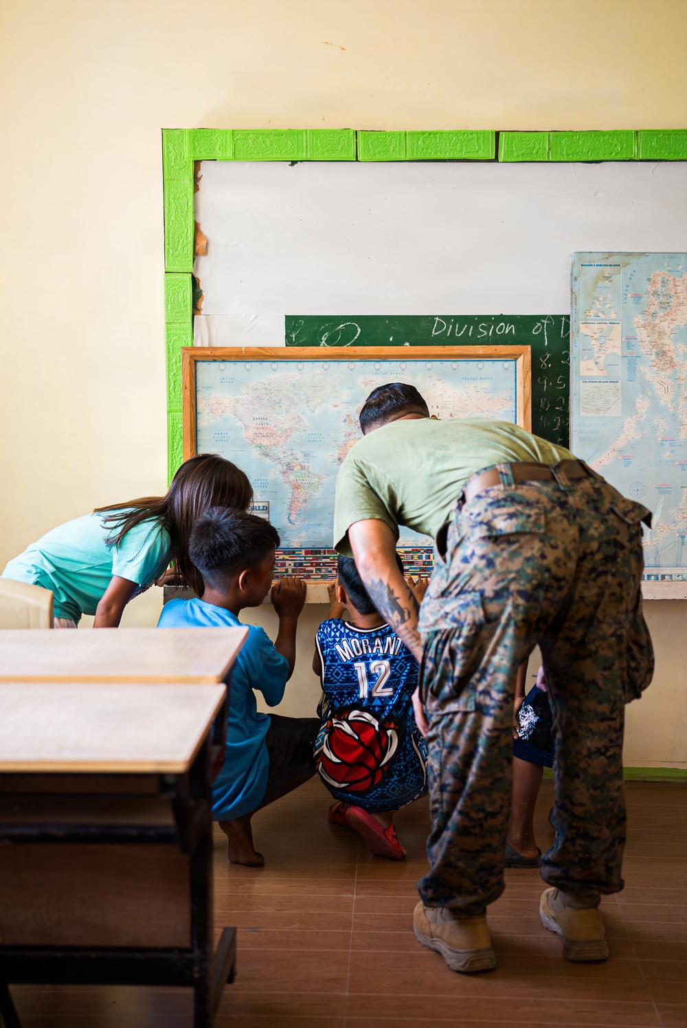 U.S. Marines and Philippine service members participate in Bobon Elementary Eskwela