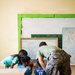 U.S. Marines and Philippine service members participate in Bobon Elementary Eskwela