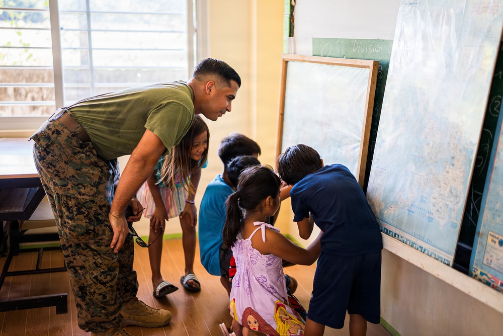 U.S. Marines and Philippine service members participate in Bobon Elementary Eskwela