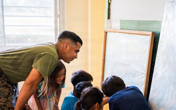 U.S. Marines and Philippine service members participate in Bobon Elementary Eskwela