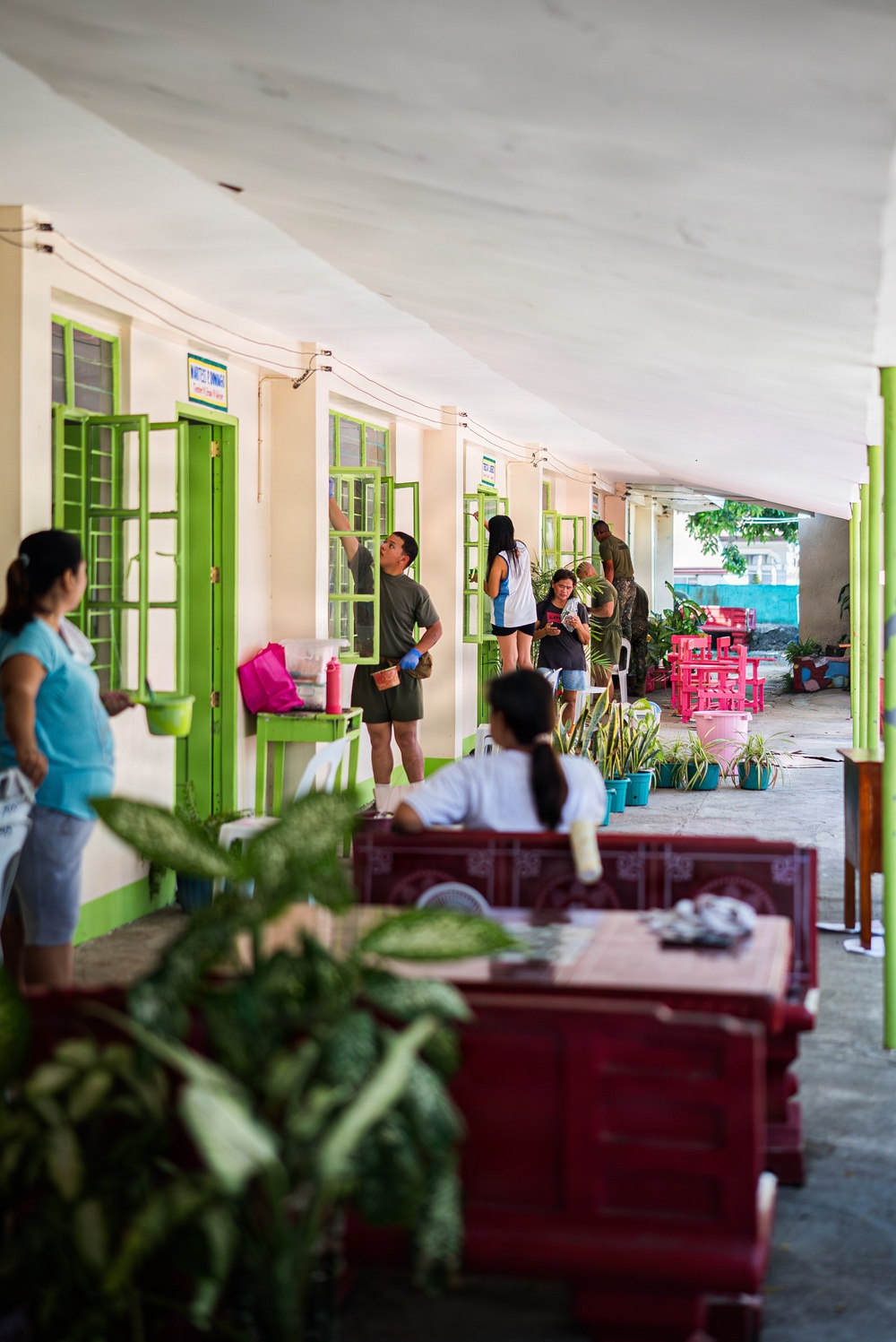 U.S. Marines and Philippine service members participate in Bobon Elementary Eskwela