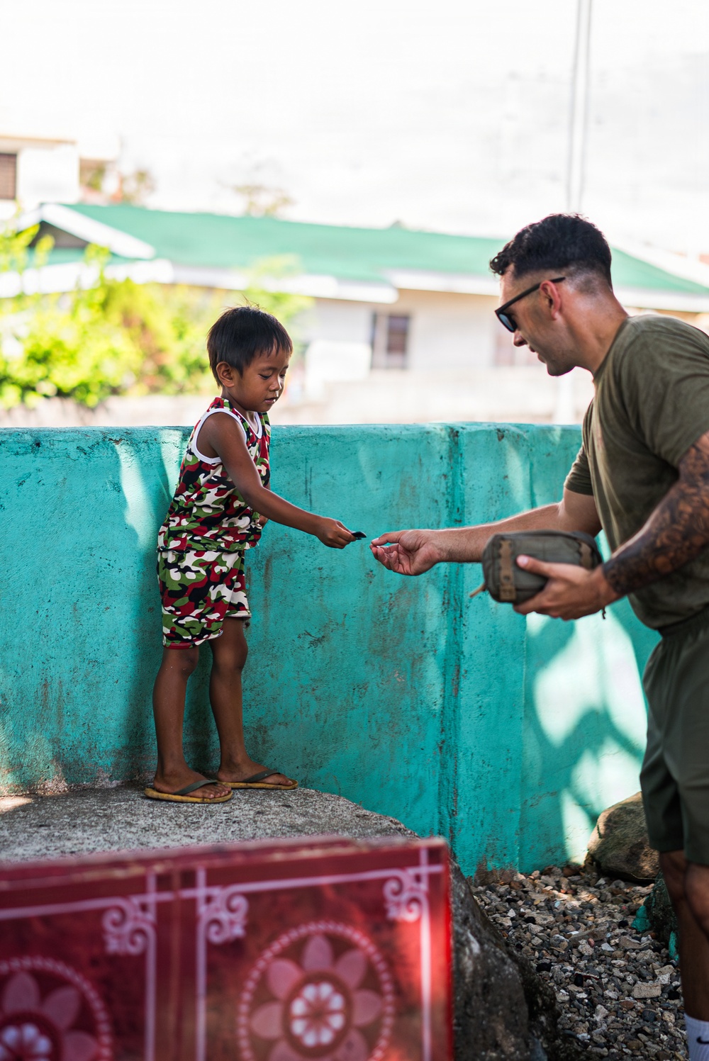 U.S. Marines and Philippine service members participate in Bobon Elementary Eskwela