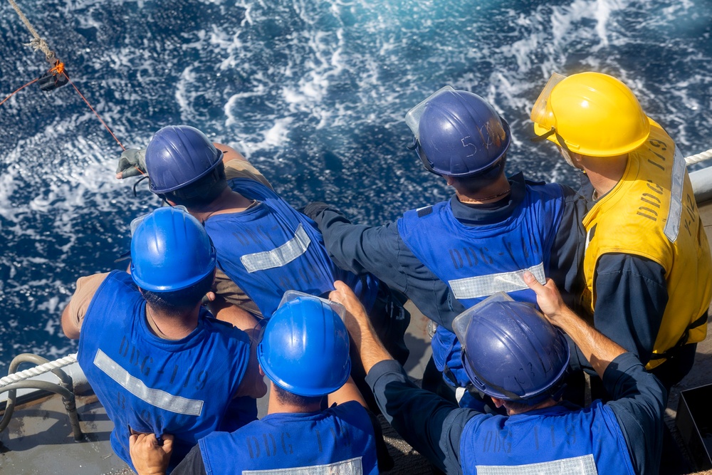USS Delbert D. Black (DDG 119) Conducts a Replenishment-at-sea