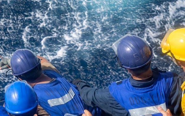 USS Delbert D. Black (DDG 119) Conducts a Replenishment-at-sea