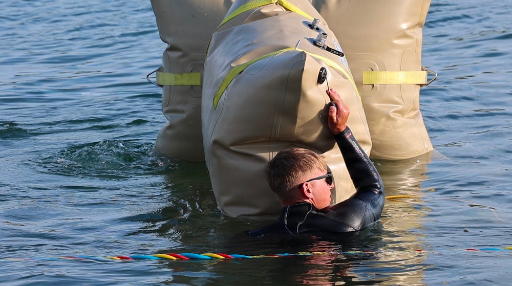 U.S. and Royal Netherlands Navy Divers Advance Boat Ramp Construction in Latvia