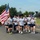 87th Security Forces Squadron carry Flame of Hope