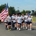 87th Security Forces Squadron carry Flame of Hope