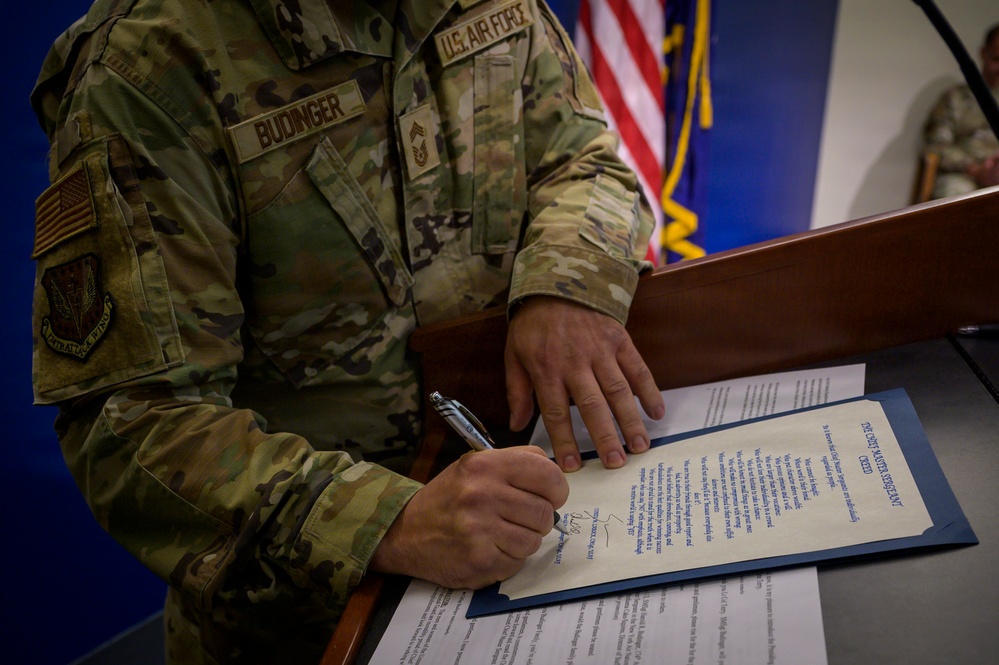 Budinger Signs Chief Master Sgt. Creed