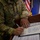 Budinger Signs Chief Master Sgt. Creed