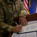 Budinger Signs Chief Master Sgt. Creed