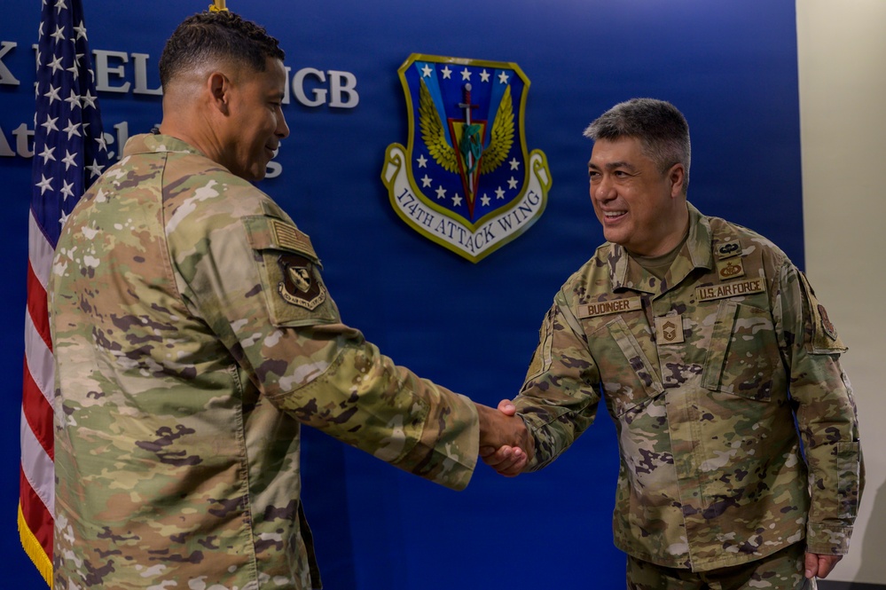 Budinger Receives First Sergeants Council Coin