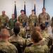 Airmen Stand at Attention at Induction Ceremony