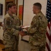 Latessa Shakes Hands With Batick at Induction Ceremony