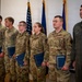 Airmen Stand at Attention at Induction Ceremony