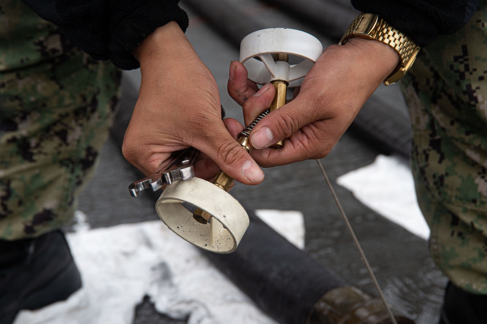 Ronald Reagan Sailors Conduct Maintenance