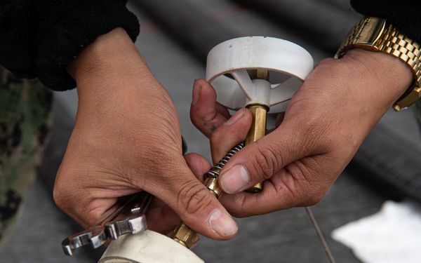 Ronald Reagan Sailors Conduct Maintenance
