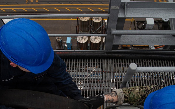 Ronald Reagan Sailors Conduct Maintenance