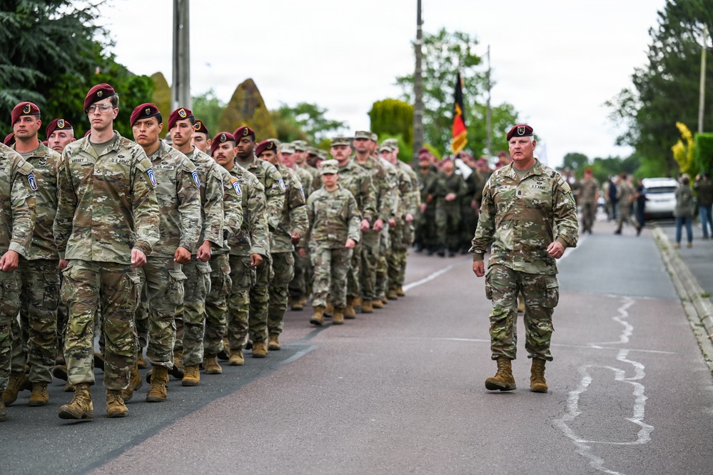 U.S., German troops march to honor 90th Infantry Division in Normandy ceremony