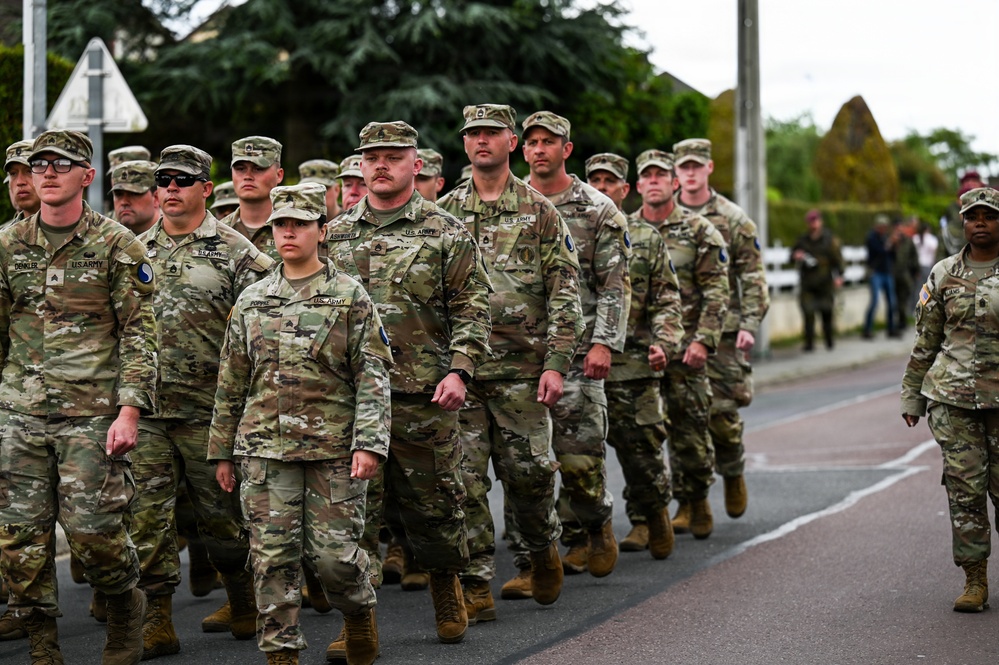 U.S., German troops march to honor 90th Infantry Division in Normandy ceremony