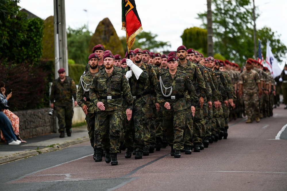U.S., German troops march to honor 90th Infantry Division in Normandy ceremony
