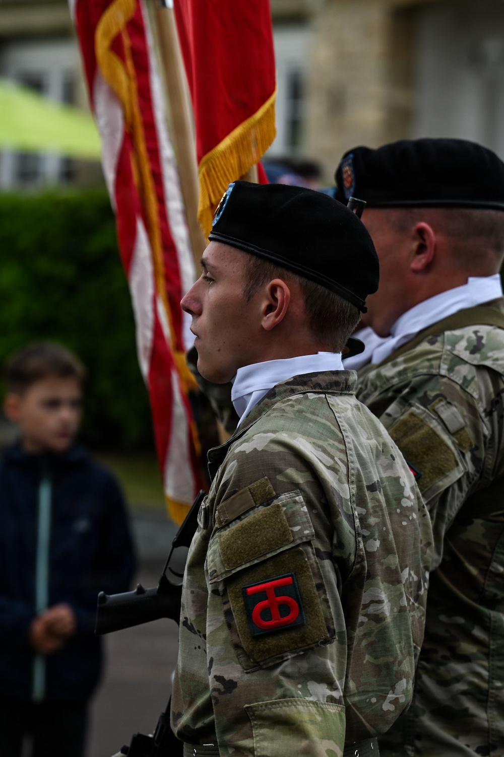 U.S., German troops march to honor 90th Infantry Division in Normandy ceremony
