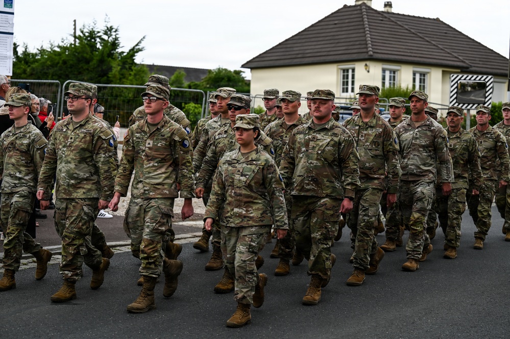 U.S., German troops march to honor 90th Infantry Division in Normandy ceremony