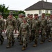 U.S., German troops march to honor 90th Infantry Division in Normandy ceremony