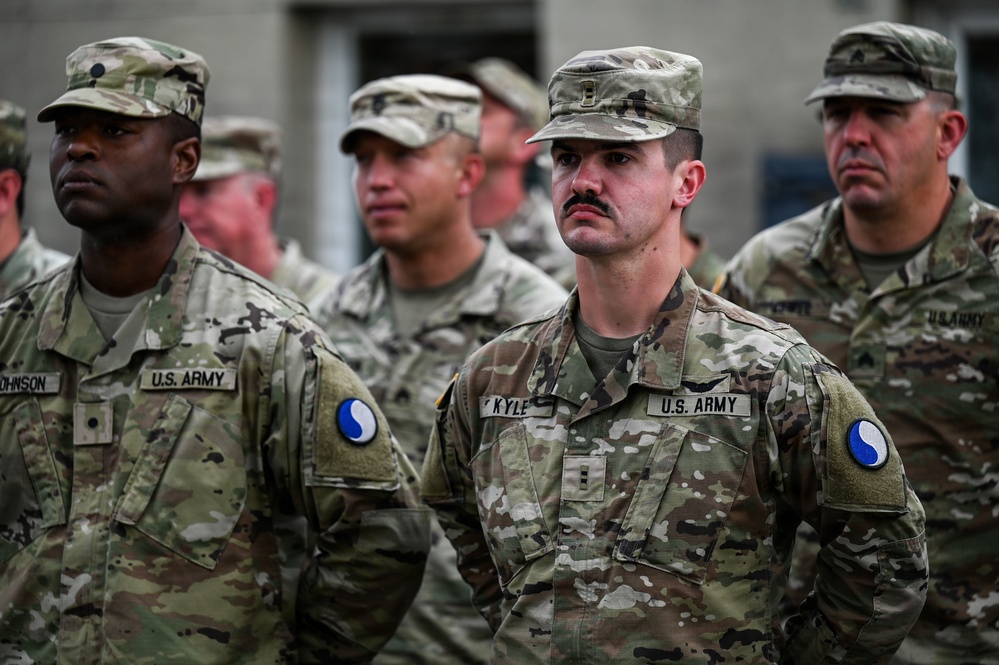 U.S., German troops march to honor 90th Infantry Division in Normandy ceremony