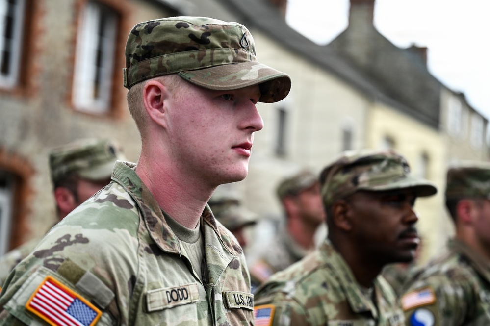 U.S., German troops march to honor 90th Infantry Division in Normandy ceremony