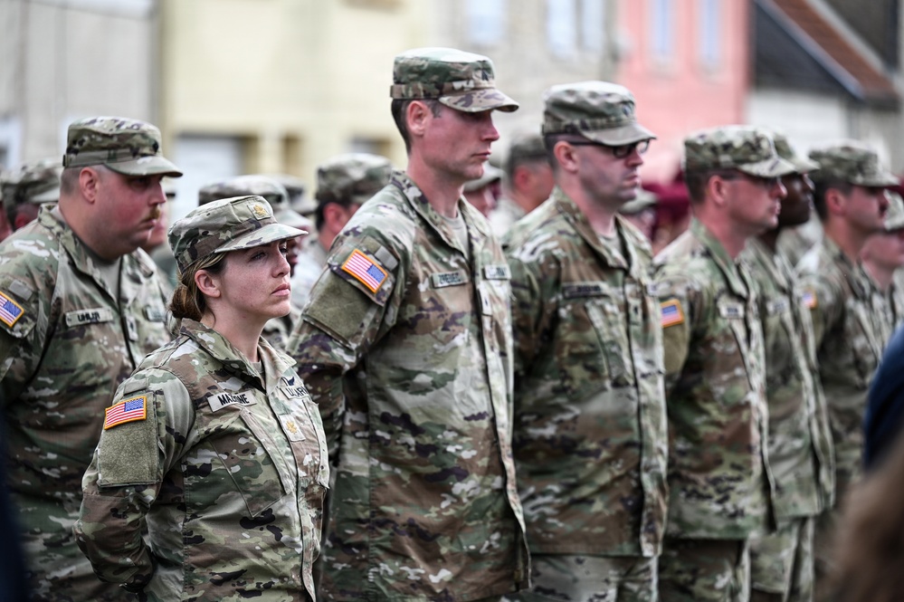 U.S., German troops march to honor 90th Infantry Division in Normandy ceremony