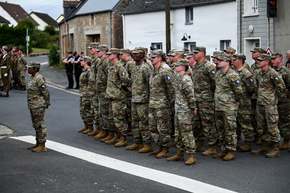 U.S., German troops march to honor 90th Infantry Division in Normandy ceremony
