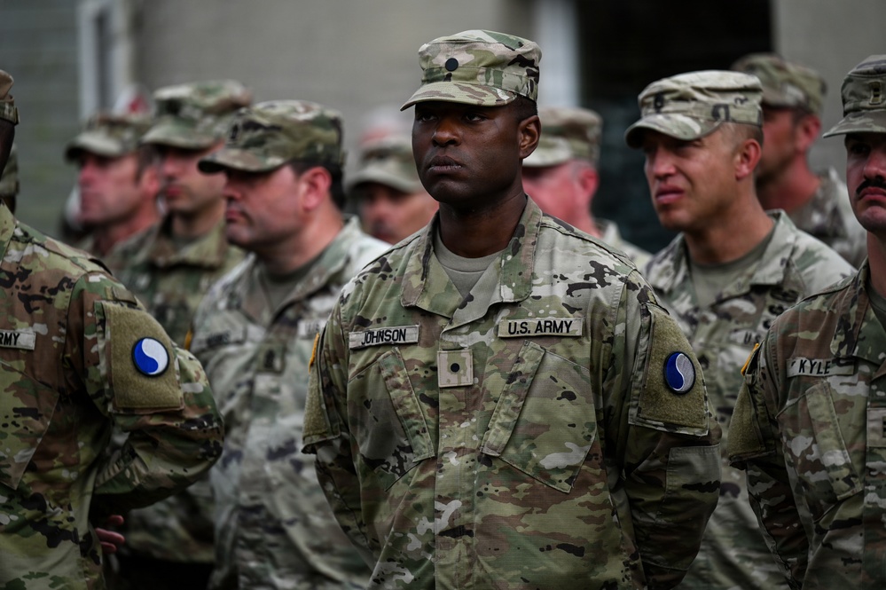 U.S., German troops march to honor 90th Infantry Division in Normandy ceremony