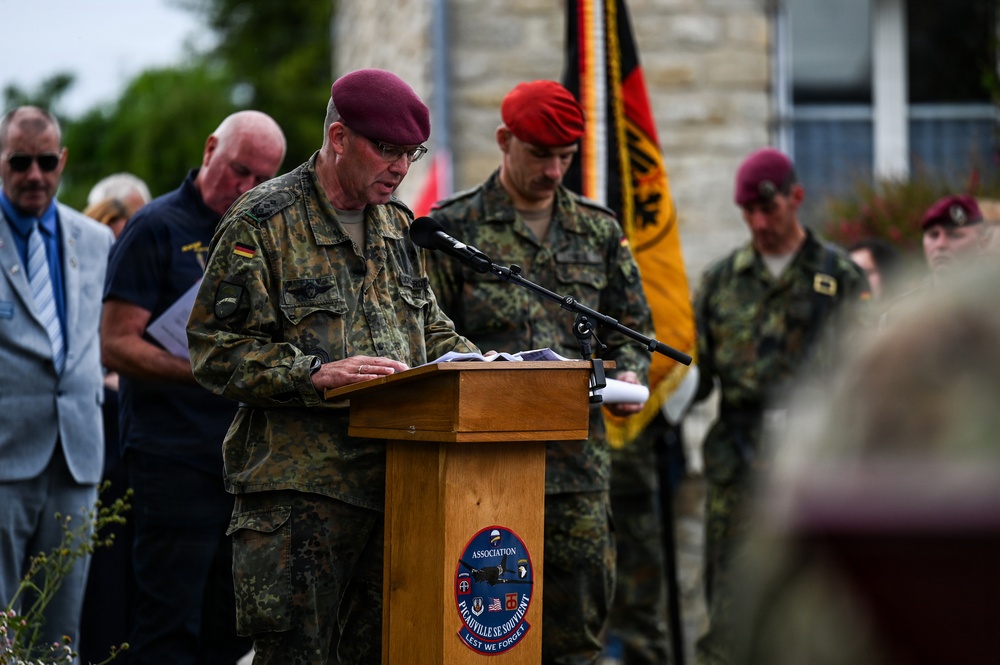 U.S., German troops march to honor 90th Infantry Division in Normandy ceremony