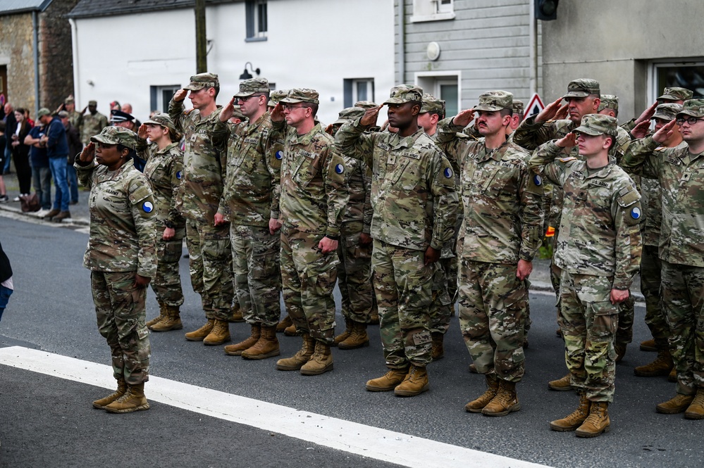 U.S., German troops march to honor 90th Infantry Division in Normandy ceremony
