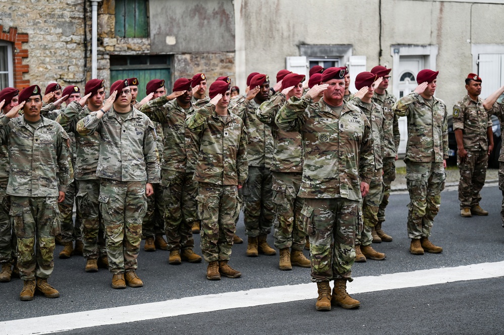 U.S., German troops march to honor 90th Infantry Division in Normandy ceremony