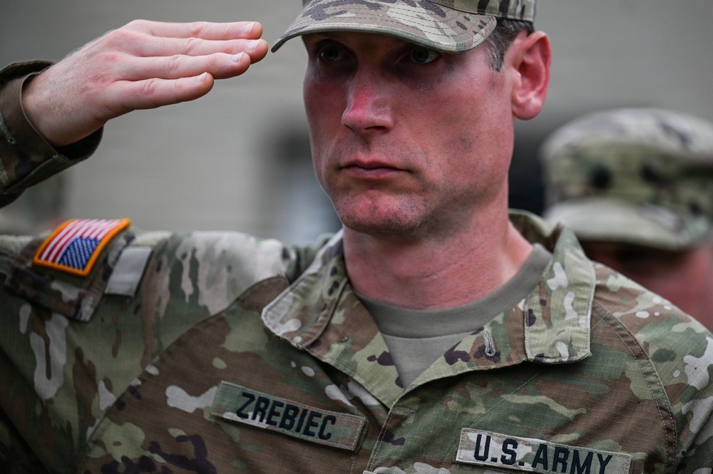 U.S., German troops march to honor 90th Infantry Division in Normandy ceremony