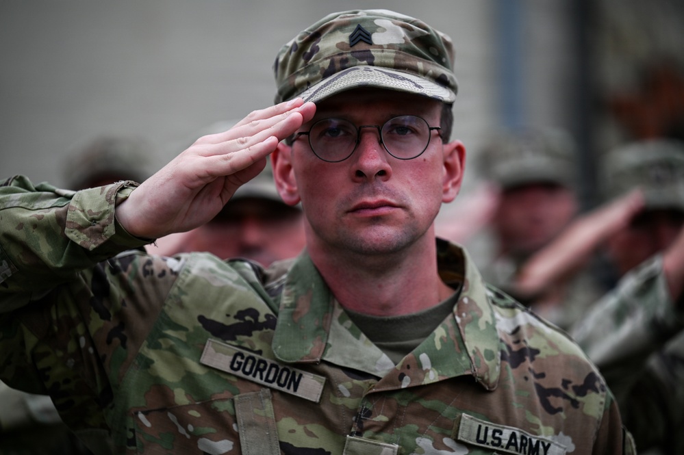 U.S., German troops march to honor 90th Infantry Division in Normandy ceremony