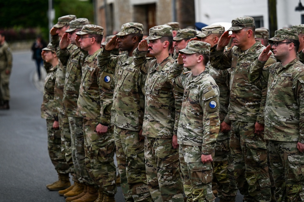 U.S., German troops march to honor 90th Infantry Division in Normandy ceremony