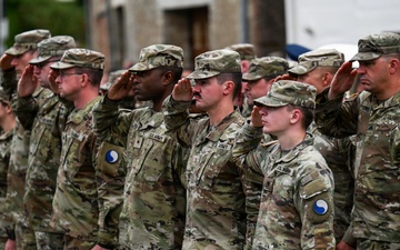 U.S., German troops march to honor 90th Infantry Division in Normandy ceremony