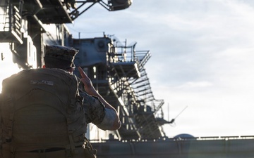 U.S. Marines assigned to 26th Marine Expeditionary Unit embark the USS Kearsarge