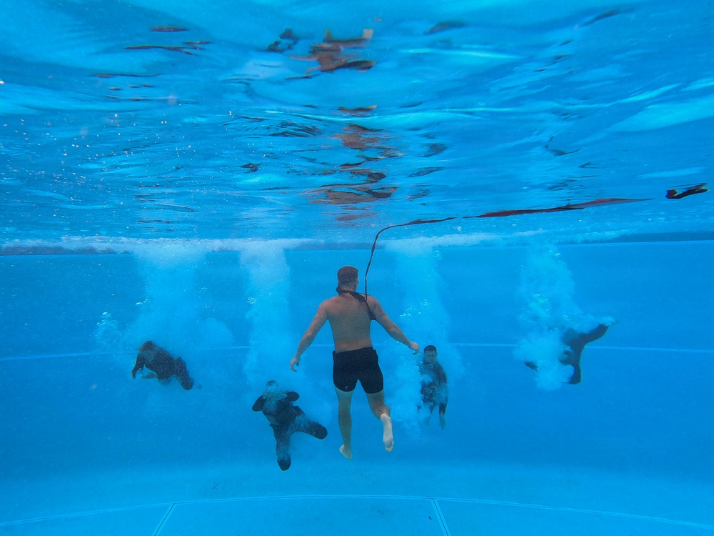 U.S. Marines with 1st CEB host a modified swim qualification for FMF