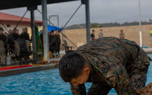 U.S. Marines with 1st CEB host a modified swim qualification for FMF