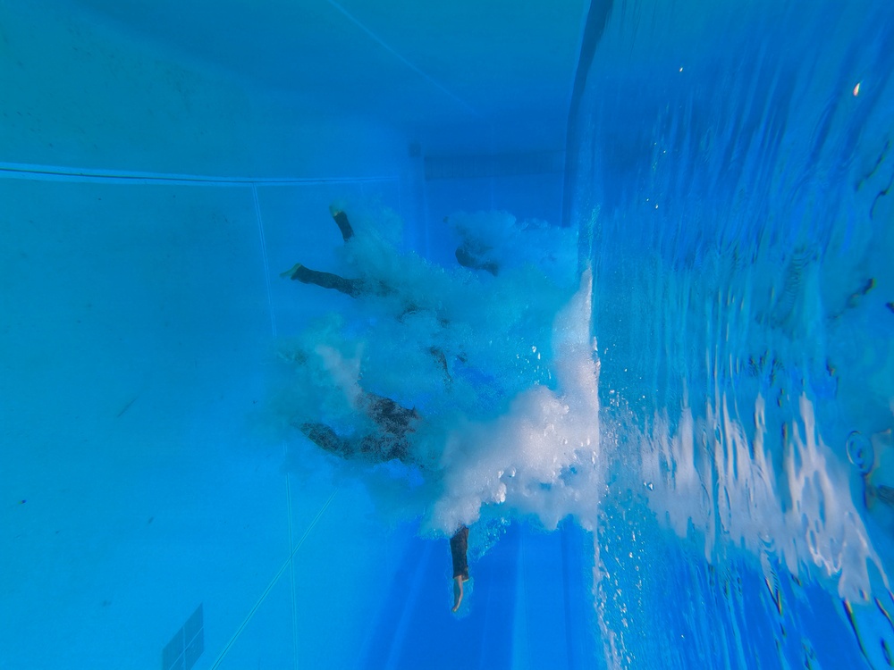 U.S. Marines with 1st CEB host a modified swim qualification for FMF