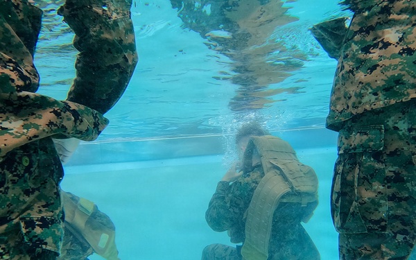 U.S. Marines with 1st CEB host a modified swim qualification for FMF