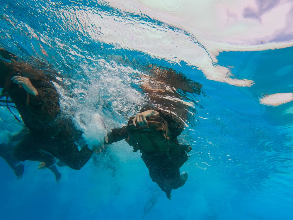 U.S. Marines with 1st CEB host a modified swim qualification for FMF